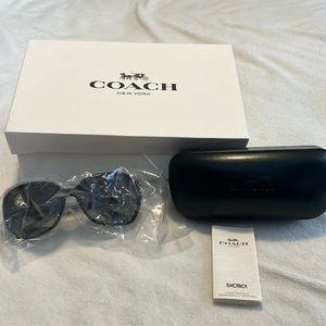 Brand new, never worn, takes still in Coach sunglasses. Received as gift.